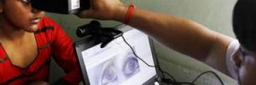 eye scan between woman and official
