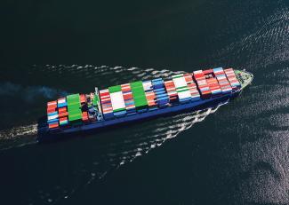 Ship with Containers on the Open Sea